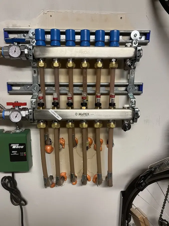 Plumber performing Gas Leak Detection at a residential property in Haysville